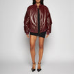 GIACCA BOMBER IN PELLE EFFETTO VERNICE – BORDEAUX