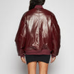 GIACCA BOMBER IN PELLE EFFETTO VERNICE – BORDEAUX