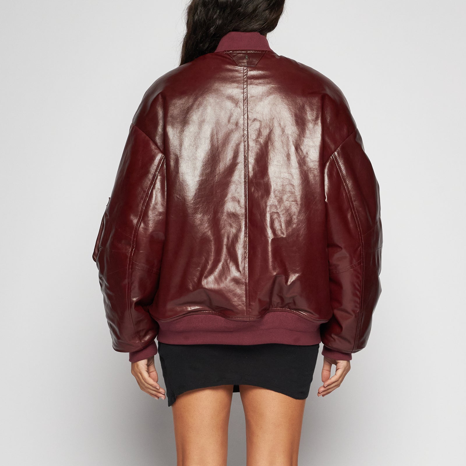 GIACCA BOMBER IN PELLE EFFETTO VERNICE – BORDEAUX